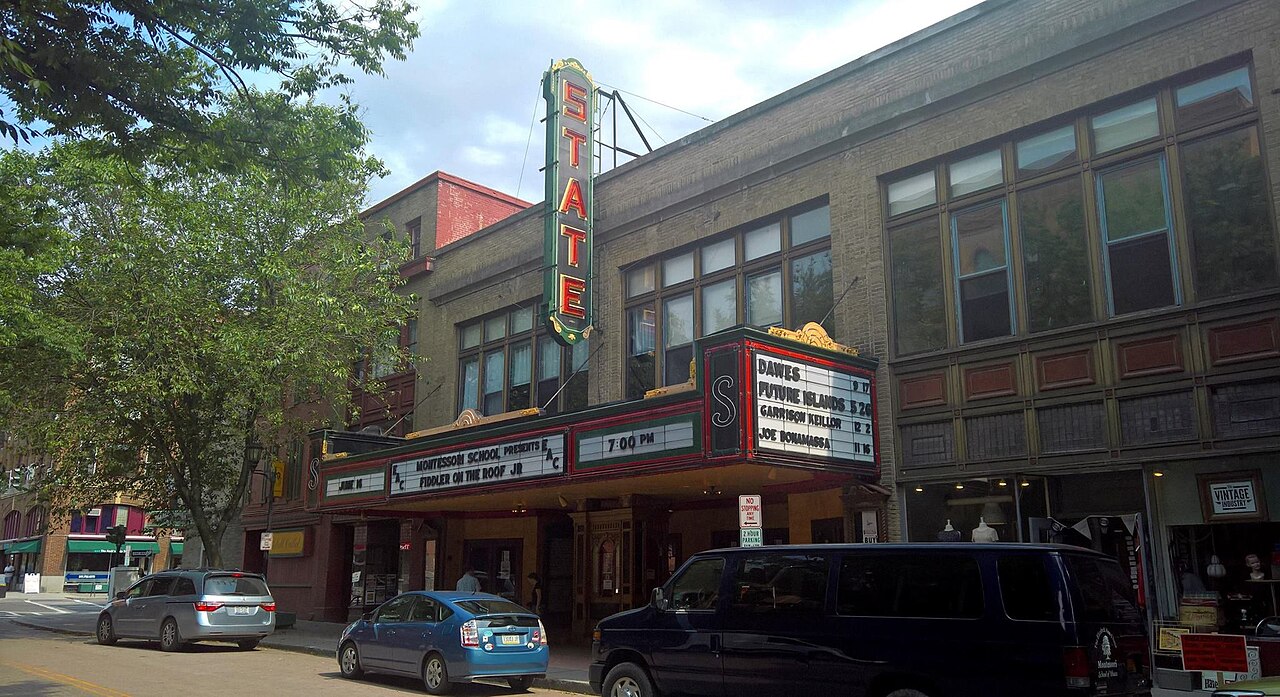 The State Theatre marquee and brick facade on State Street in downtown Ithaca.